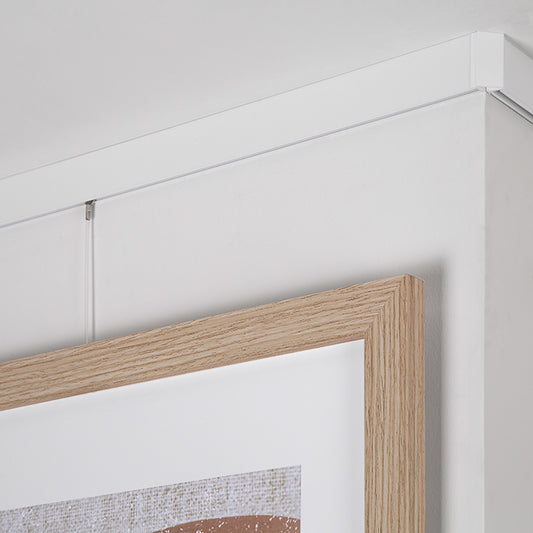 STAS cliprail max supporte 25 kg/m pour un accrochage sécurisé de tableaux.